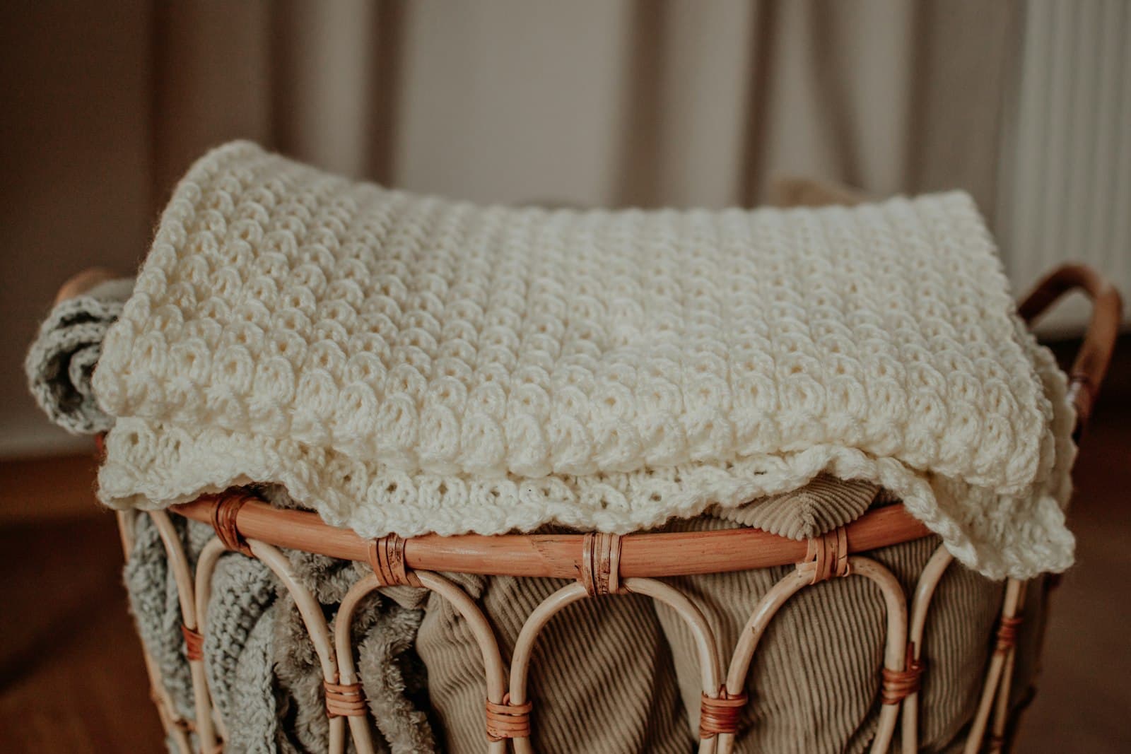 A basket of folded baby linens β the everyday side of getting ready