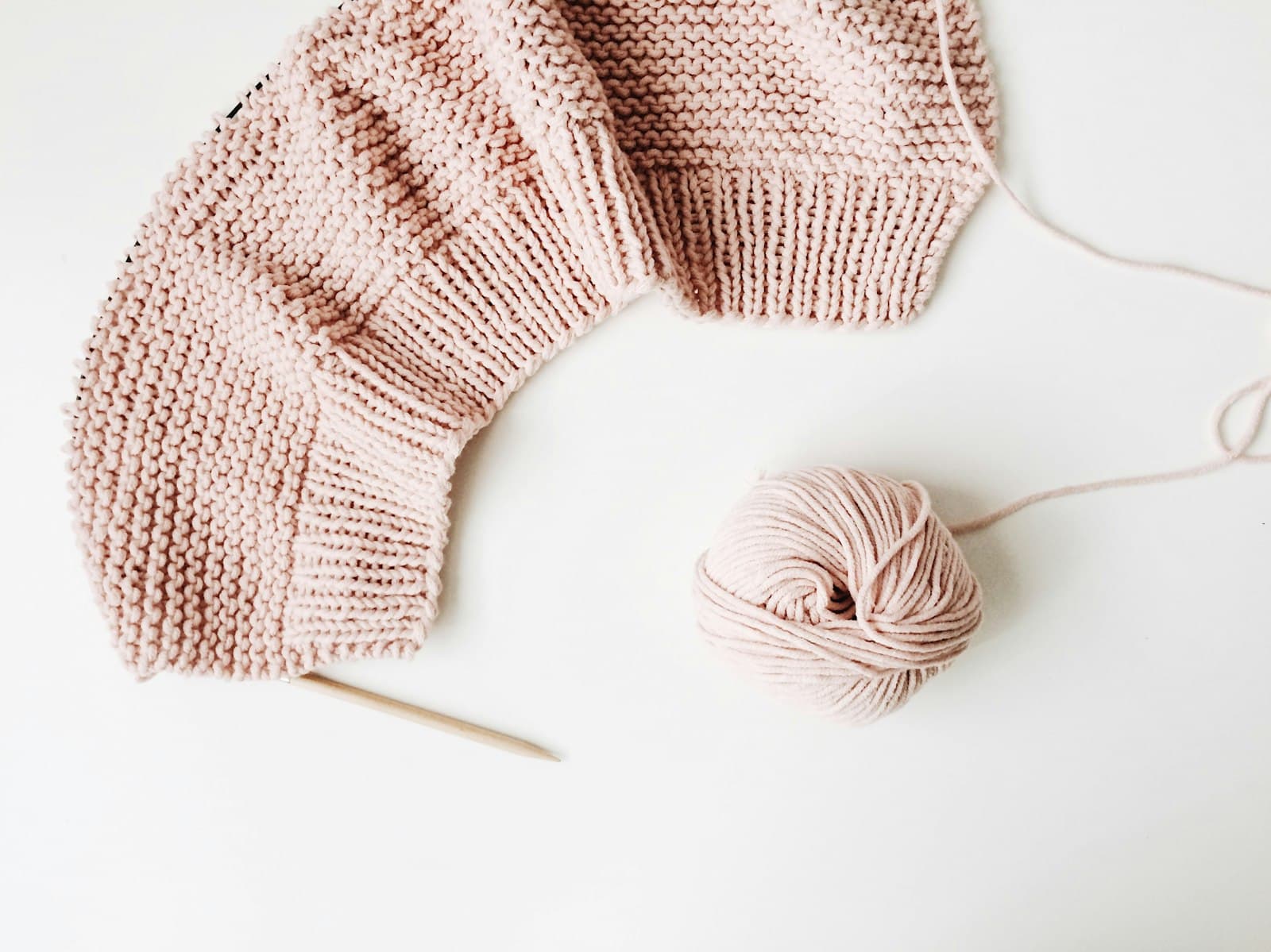 A close weave of beige knitting β the quiet, unhurried tone the writing aims for
